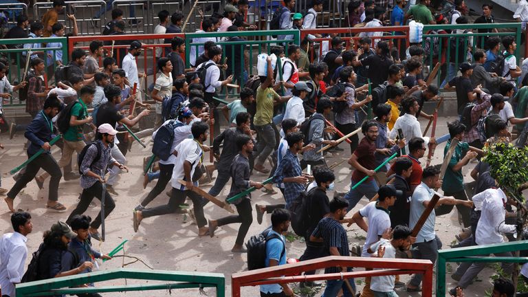 Bangladesh Chhatra League, the student wing of the ruling party Bangladesh Awami League, and anti-quota protesters engage in a clash at the Dhaka College area, in Dhaka, Bangladesh.
Pic: Reuters