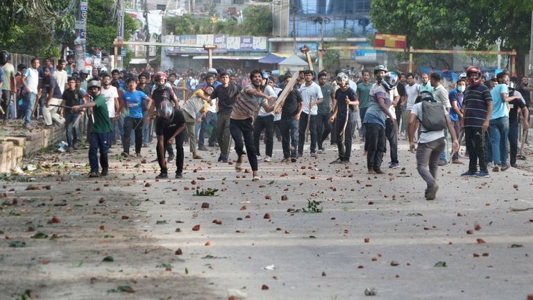 Students clash over quota system at Jahangir Nagar University at Savar outside Dhaka, Bangladesh, Monday, July 15, 2024. Police have fired tear gas and charged with batons overnight during violent clashes between a pro-government student body and student protesters, leaving dozens injured at a leading public university outside Bangladesh's capital over quota system in government jobs, police and students said Tuesday. (AP Photo/Al-emrun Garjon)