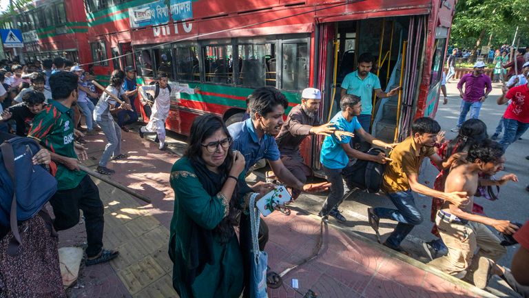 Students clash over quota system at Jahangir Nagar University at Savar outside Dhaka, Bangladesh, Monday, July 15, 2024. Police have fired tear gas and charged with batons overnight during violent clashes between a pro-government student body and student protesters, leaving dozens injured at a leading public university outside Bangladesh's capital over quota system in government jobs, police and students said Tuesday.(AP Photo/Abdul Goni)