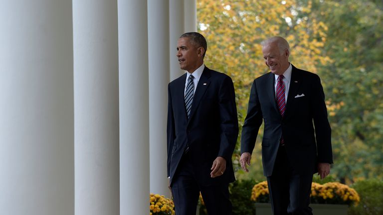 President Barack Obama and Vice President Joe Biden walk from the Oval Office to the Rose Garden of the White House in Washington, Wednesday, Nov. 9, 2016, to make a statement on the election results. (AP Photo/Susan Walsh)