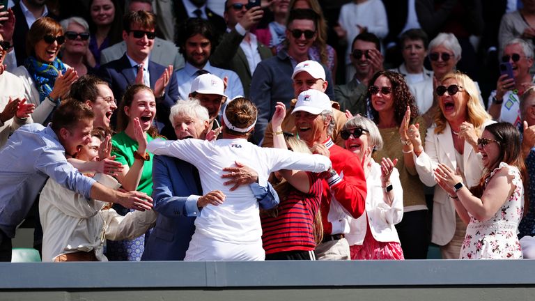 Barbora Krejcikova celebrates with friends, coaches and family. Pic: PA

