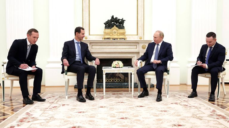 Bashar Assad speaks with Vladimir Putin during their meeting in Moscow.
PIc: Sputnik/AP