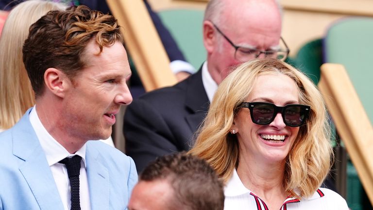 Benedict Cumberbatch and Julia Roberts in the royal box on day fourteen of the 2024 Wimbledon Championships at the All England Lawn Tennis and Croquet Club, London. Picture date: Sunday July 14, 2024. PA Photo. See PA story TENNIS Wimbledon. Photo credit should read: Mike Egerton/PA Wire.....RESTRICTIONS: Editorial use only. No commercial use without prior written consent of the AELTC. Still image use only - no moving images to emulate broadcast. No superimposing or removal of sponsor/ad logos.            