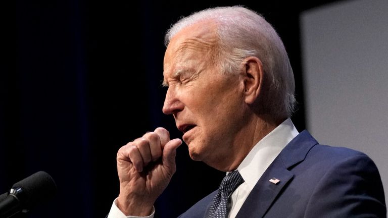 The White House said Biden is experiencing 'mild symptoms' from the infection.