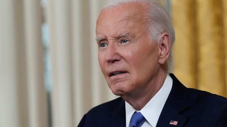  Joe Biden addresses the nation from the Oval Office of the White House in Washington, Wednesday, July 24, 2024, about his decision to drop his Democratic presidential reelection bid. Evan Vucci/Pool via REUTERS