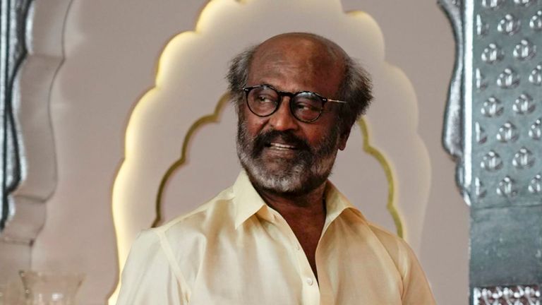 Indian Tamil actor Rajinikanth arrives at the wedding