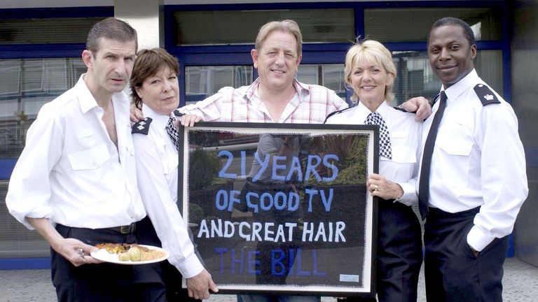 Jeff Stewart, Roberta Taylor, Mark Wingett, Trudie Goodwin and Cyril Nri pose with an artwork given to the ITV show by artist Tracey Emin to celebrate the police drama's 21st anniversary.
Pic: PA