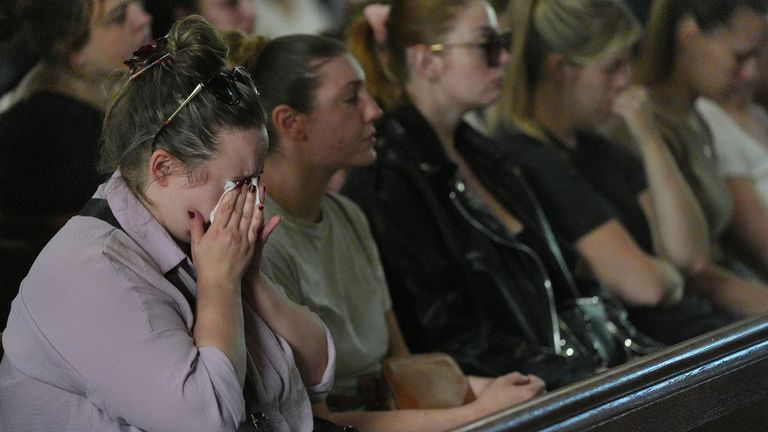 Locals in tears at St James's church's Thursday morning service in Bushey. Pic: PA