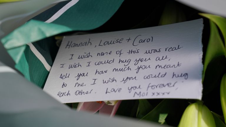 A message on a floral tribute near to the scene in Ashlyn Close, Bushey, Hertfordshire, where the wife and two daughters of a BBC sports commentator have been killed in a crossbow attack at their home. Carol Hunt, 61, who was married to BBC Five Live racing commentator John Hunt, and two of their daughters died in Ashlyn Close, Bushey, Hertfordshire, on Tuesday evening. A manhunt has been launched for Kyle Clifford, 26, from Enfield, north London, who is wanted by detectives investigating the mu