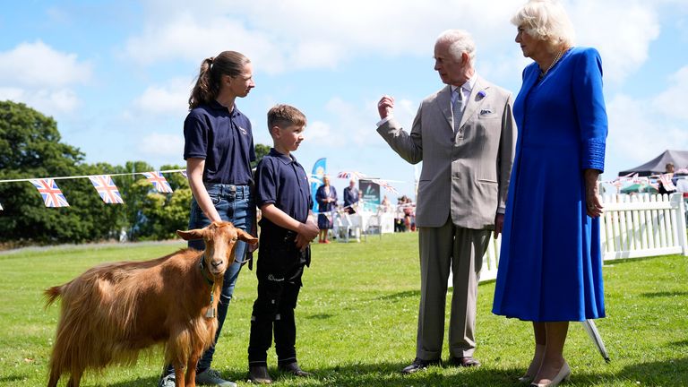 The King and Queen with Joe Corr and his goat Tamsin. Pic: PA