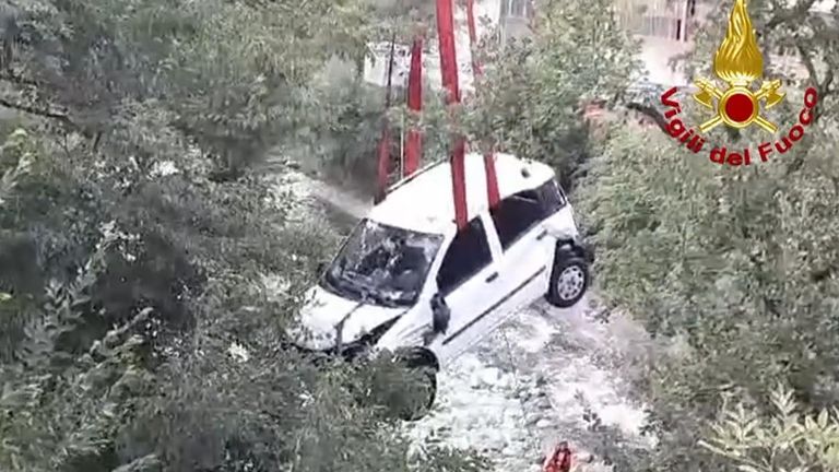 Car falls from bridge in Italy