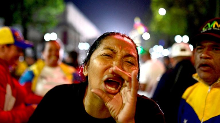 Supporters of Venezuela's President Nicolas Maduro celebrate the results after the presidential election in Caracas, Venezuela.
Pic: Reuters