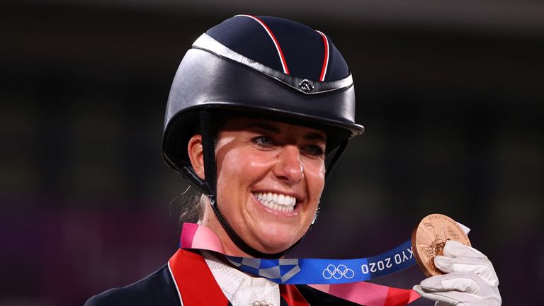 Charlotte Dujardin with a bronze she won at the Tokyo Olympics in 2021. Pic: Reuters