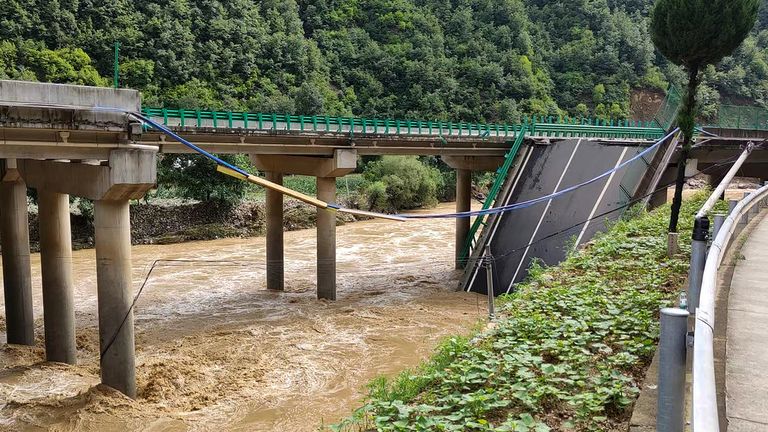 Local media said five vehicles that fell off the bridge have been recovered. Pic: Xinhua/AP