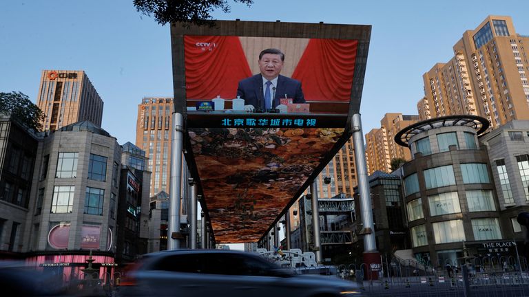 A giant screen shows news footage of Chinese President Xi Jinping attending the third plenary session of the 20th Central Committee of the Communist Party of China (CPC), in Beijing, China July 18, 2024. Pic: Reuters 