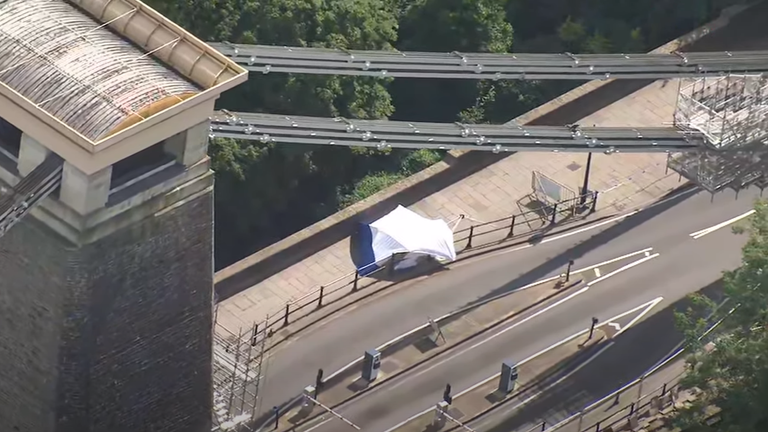 A police tent on the Clifton suspension bridge where suitcases containing what are believed to be body parts were found.