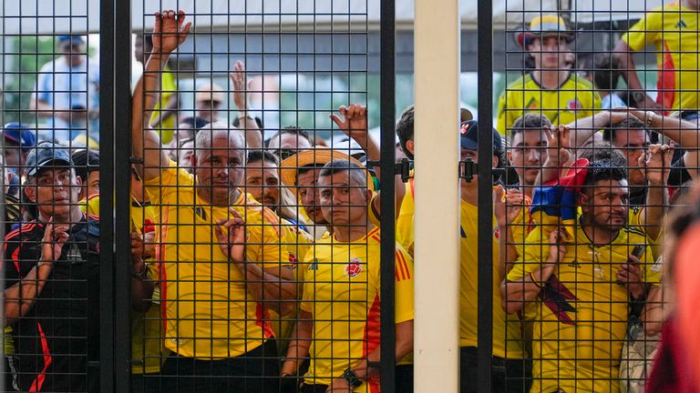 Fans wait to enter the stadium prior to the Copa America final soccer match between Argentina and Colombia in Miami Gardens, Fla., Sunday, July 14, 2024. (AP Photo/Lynne Sladky)