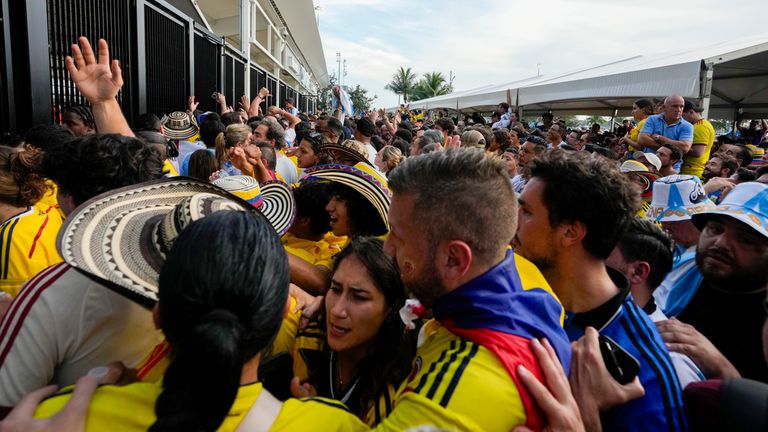 Fans wait to enter the stadium prior to the Copa America final soccer match between Argentina and Colombia in Miami Gardens, Fla., Sunday, July 14, 2024. (AP Photo/Lynne Sladky)