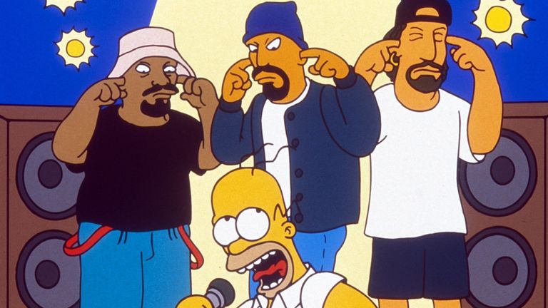 Cypress Hill in The Simpsons, back row from left: Sen DOG, Deejay Muggs, B-Real, with Homer Simpson in front, in the Homerpalooza episodes in season seven in 1996. Pic: 20th Century Fox Film Corp/Courtesy Everett Collection/Shutterstock