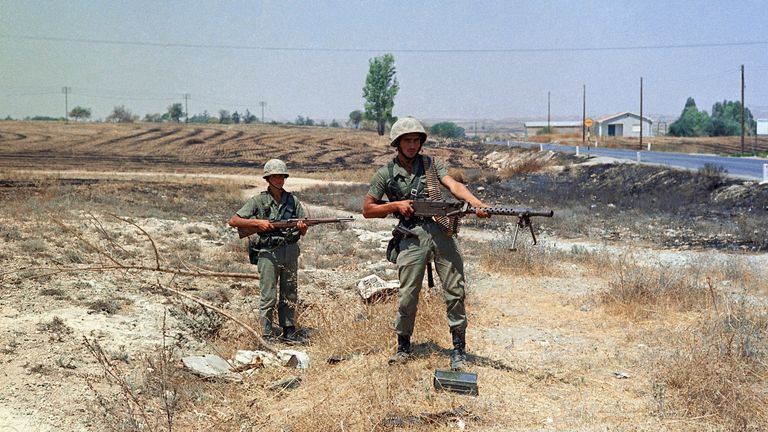 Turkish troops on the frontline some 5oo yards form the outer perimeter and 400 yards from Greek position at the Nicosia Airport, July 25, 1974, Nicosia, Cyprus. (AP Photo/Max Nash)