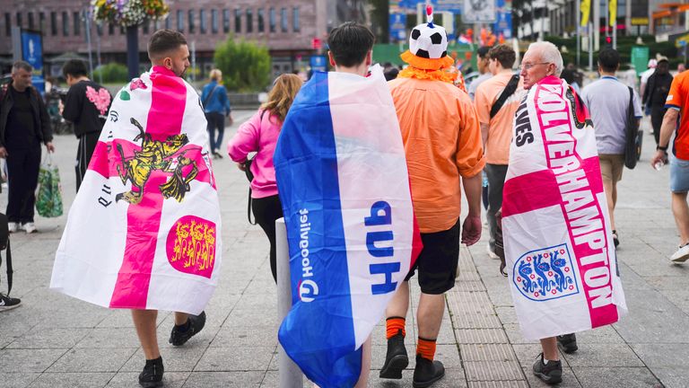 Netherlands and England fans arrive in the city. Pic: AP