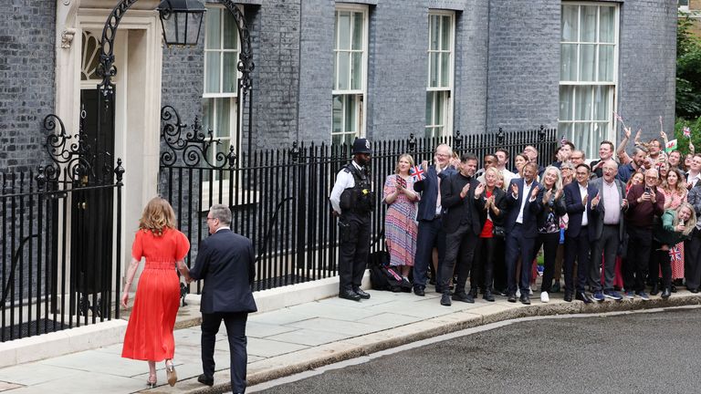 British Prime Minister Keir Starmer and his wife Victoria Starmer walk at Number 10 Downing Street, following the results of the election, in London, Britain, July 5, 2024. REUTERS/Kevin Coombs