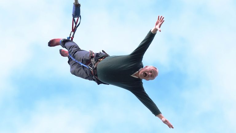 Liberal Democrat leader Ed Davey bungee jumping  during a visit to Eastbourne Borough Football Club.
Pic:PA