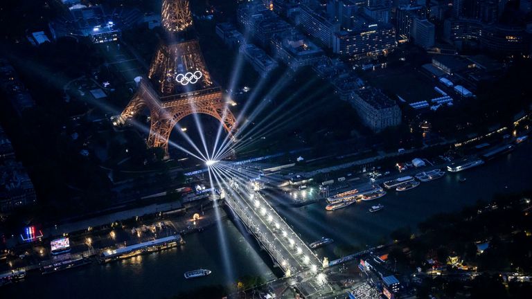 The Eiffel Tower and the Olympics rings are lit up during the opening ceremony.
Pic AP