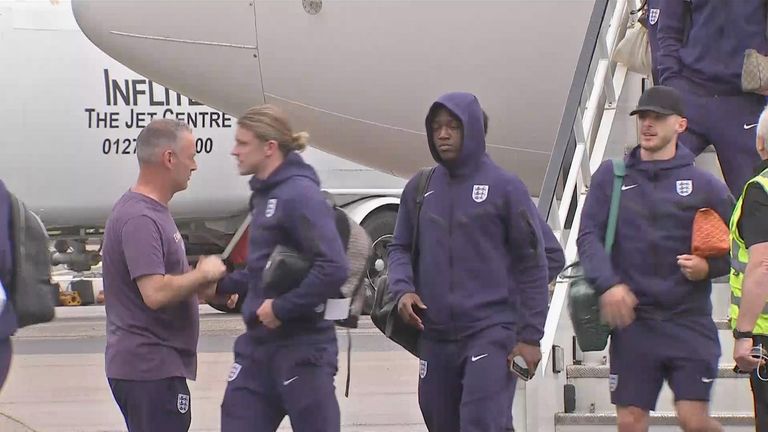 England players leaving the plane after Sunday's final loss to Spain