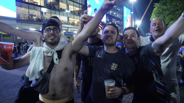 England fans celebrate in Dortmund after semi-final victory