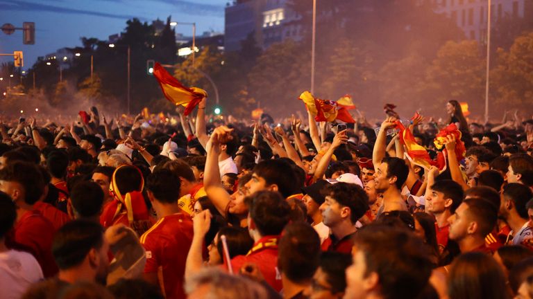 Spanish fans celebrate a goal at the Plaza de Colon in Madrid. Pic: AP