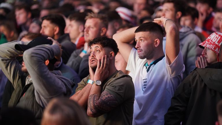 England fans at Central Park in Newcastle react after their team conceded a second goal. Pic: PA