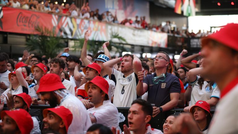 England fans react at BOXPark Wembley in London. Pic: PA