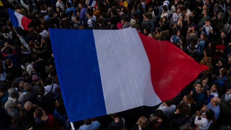 People gather at Republique plaza in a protest following results in the first round of France's elections. Pic: AP