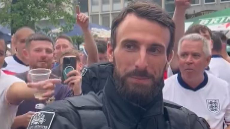 England fans serenade a German police officer who resembles Gareth Southgate