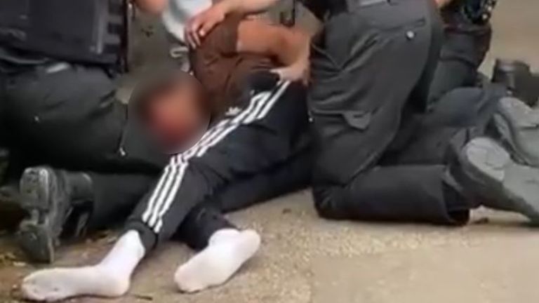 The suspect being arrested