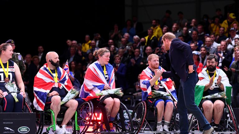 Harry meets members of the UK's wheelchair basketball team in the Netherlands 