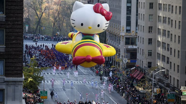 The "Hello Kitty" balloon makes its way down 6th Avenue during the 89th Macy's Thanksgiving Day Parade in the Manhattan borough of New York, November 26, 2015. REUTERS/Carlo Allegri