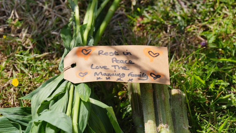 A note left on flowers at the crime scene in Bushey. Pic: PA