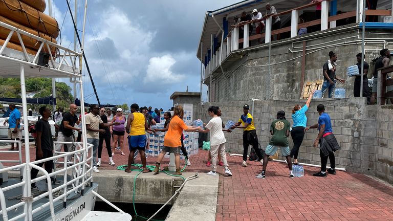Essential supplies are being loaded onto a vessel at Grenada Yacht Club, destined for the island of Carriacou which was hit hard by Hurricane Beryl, in St. George's, Grenada July 2, 2024. REUTERS/Curlan Chrissey Campbell NO RESALES. NO ARCHIVES