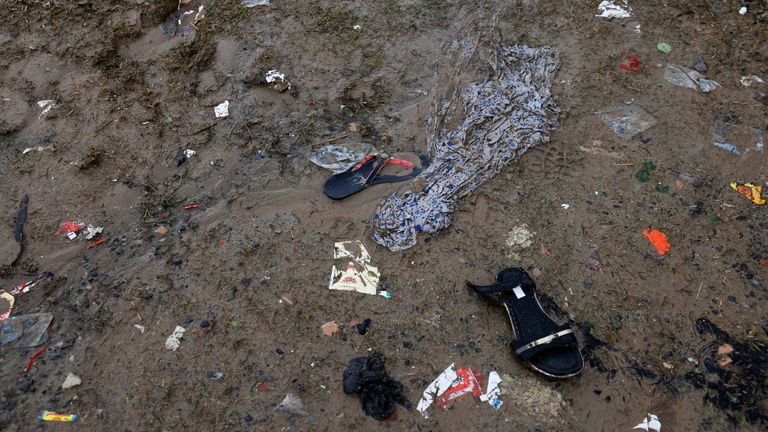 Footwears of people are seen at the site of a stampede where believers had gathered for a Hindu religious congregation, in Hathras district of the northern state of Uttar Pradesh, India, July 3, 2024. REUTERS/Anushree Fadnavis