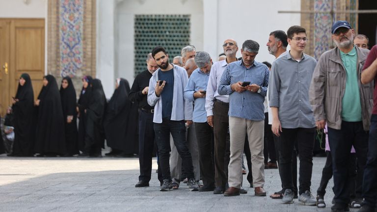 People line up to vote in the run-off presidential election between Masoud Pezeshkian and Saeed Jalili in Tehran, Iran, July 5, 2024. Majid Asgaripour/WANA (West Asia News Agency) via REUTERS ATTENTION EDITORS - THIS PICTURE WAS PROVIDED BY A THIRD PARTY