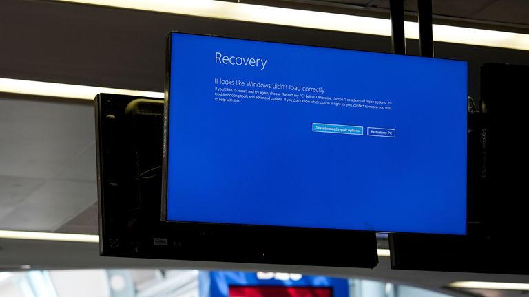Error messages on screens at Chicago O'Hare International Airport after software issues delayed and cancelled flights globally. Pic: AP