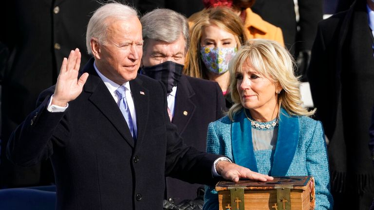 President Joe Biden is sworn in as president alongside his wife Jill Biden in 2021. Pic: AP