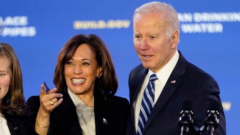 President Joe Biden stands on stage with Vice President Kamala Harris and Jana Curtis, founder of Get the Lead Out Riverwards, before he speaks about his infrastructure agenda while announcing funding to upgrade Philadelphia's water facilities and replace lead pipes, Friday, Feb. 3, 2023, at Belmont Water Treatment Center in Philadelphia. (AP Photo/Patrick Semansky)