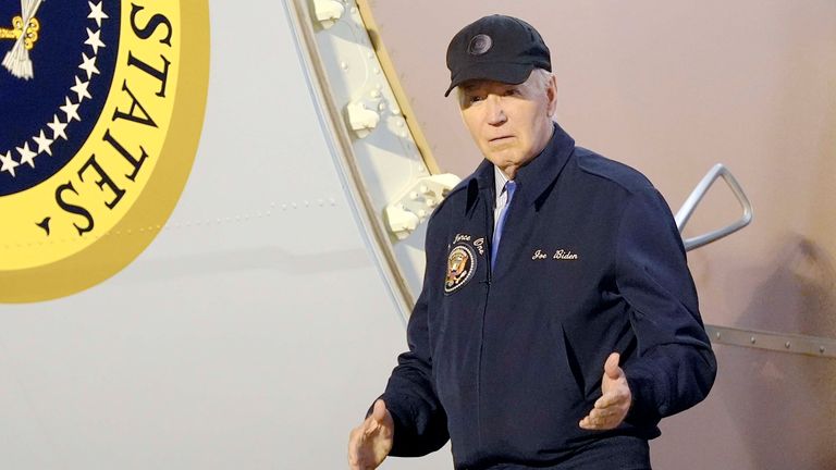 Joe Biden walks down the steps of Air Force One at Dover Air Force Base .
 Pic: Reuters