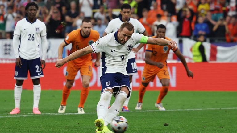 Kane takes England's penalty to level the score. Pic: Reuters