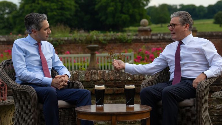 Prime Minister Sir Keir Starmer (right) and Taoiseach Simon Harris drink a pint of Guinness during his visit to Chequers, the country house of the serving Prime Minister of the United Kingdom, near Aylesbury, Buckinghamshire. Picture date: Wednesday July 17, 2024. PA Photo. See PA story POLITICS Ireland. Photo credit should read: Carl Court/PA Wire.