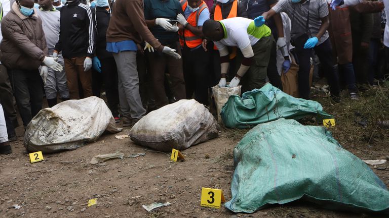 Bags with humans remains were removed from the quarry in Nairobi. Pic: AP