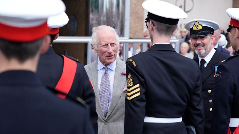 King Charles speaks to cadets as he arrives to view the presentation of the King's Colour to the Jersey Sea Cadets.
Pic PA